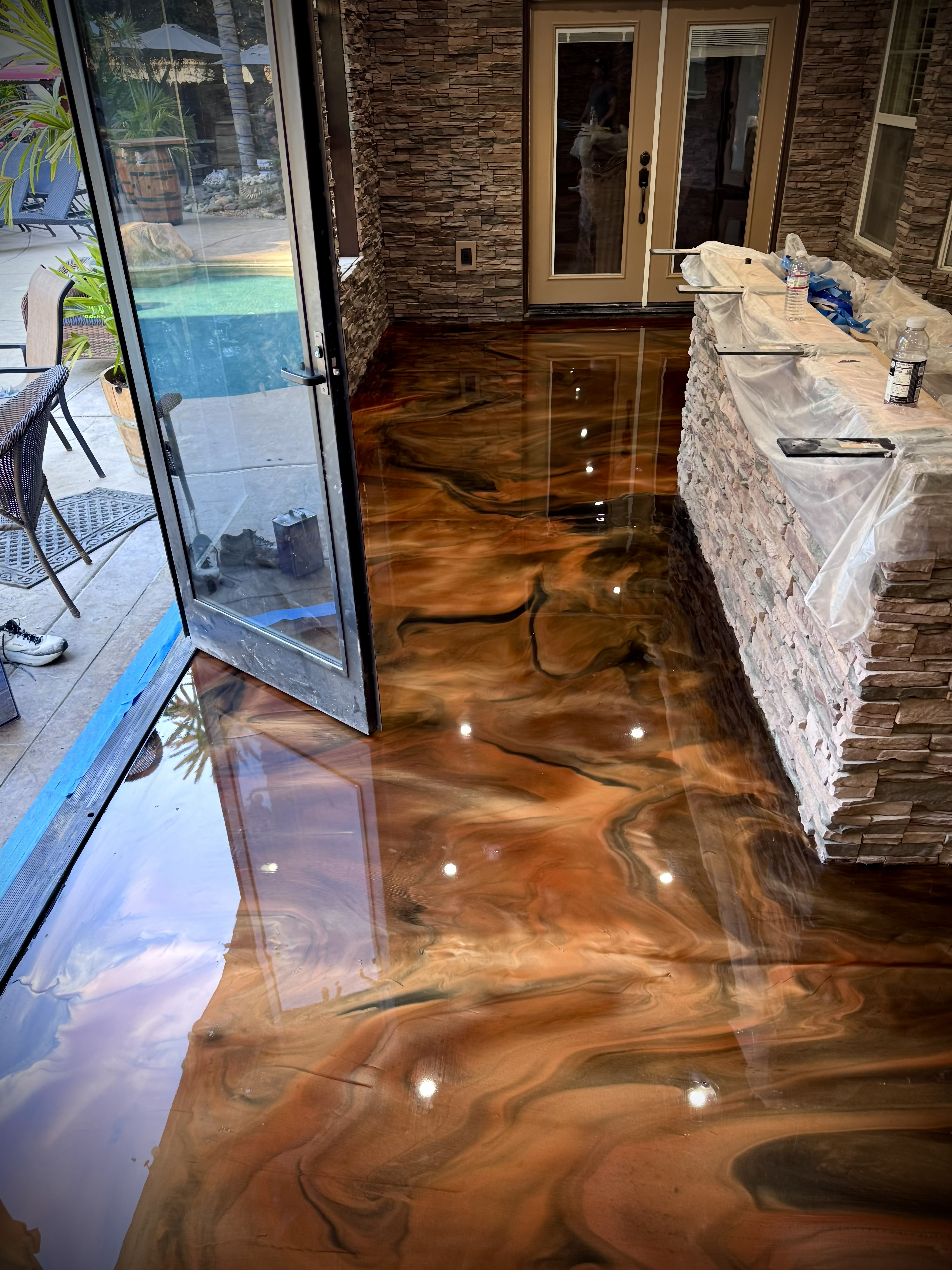 Warm copper metallic epoxy floor detail